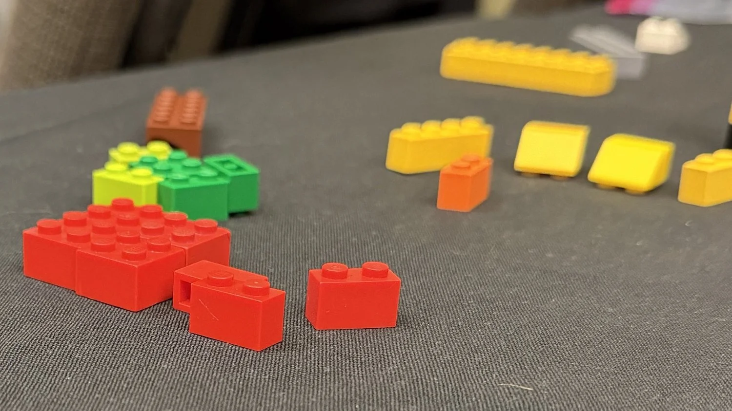 Insights on AI and Human Skills Through Creative LEGO Activities